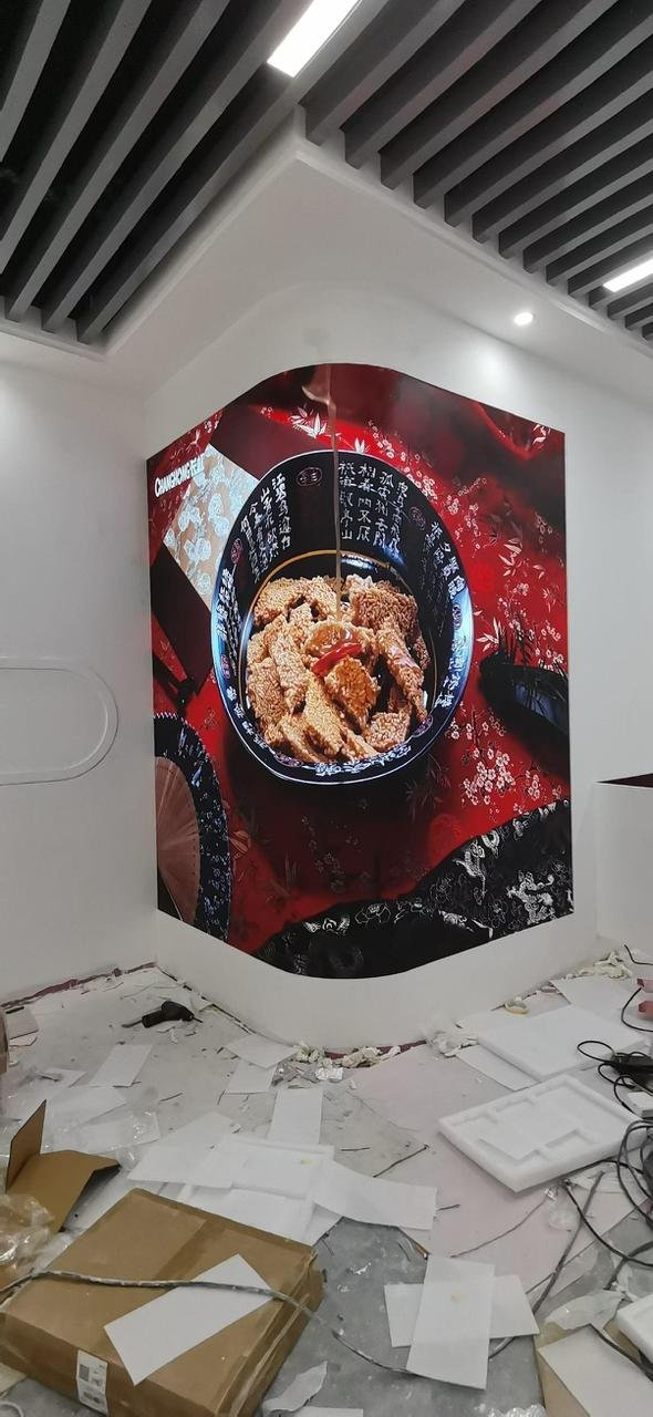 A massive, vibrant LED video wall at a live event